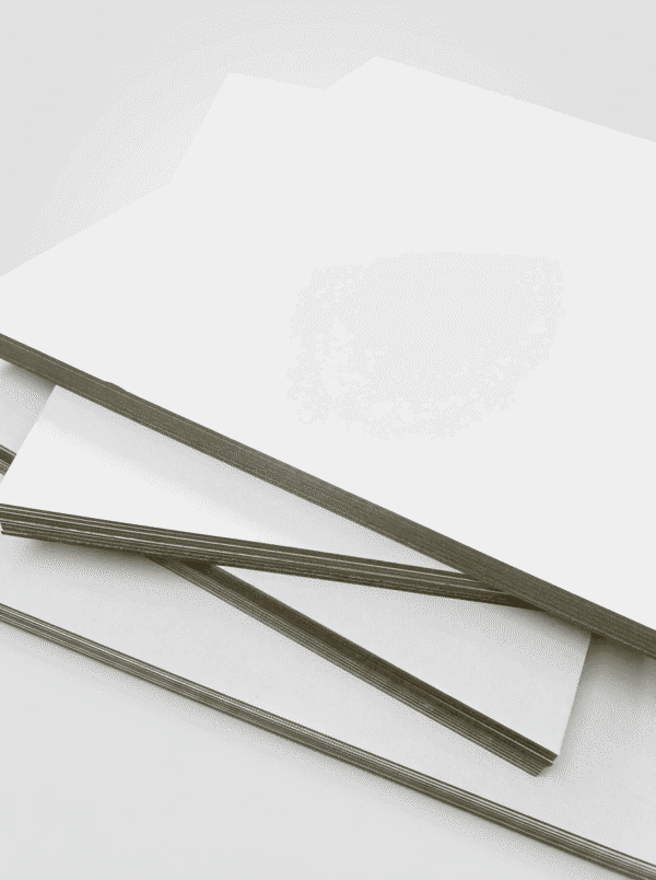 Duplex Board with Grey Back stacked in multiple formats for printing and carton production Duplex Board with Grey Back stacked in multiple formats for printing and carton production