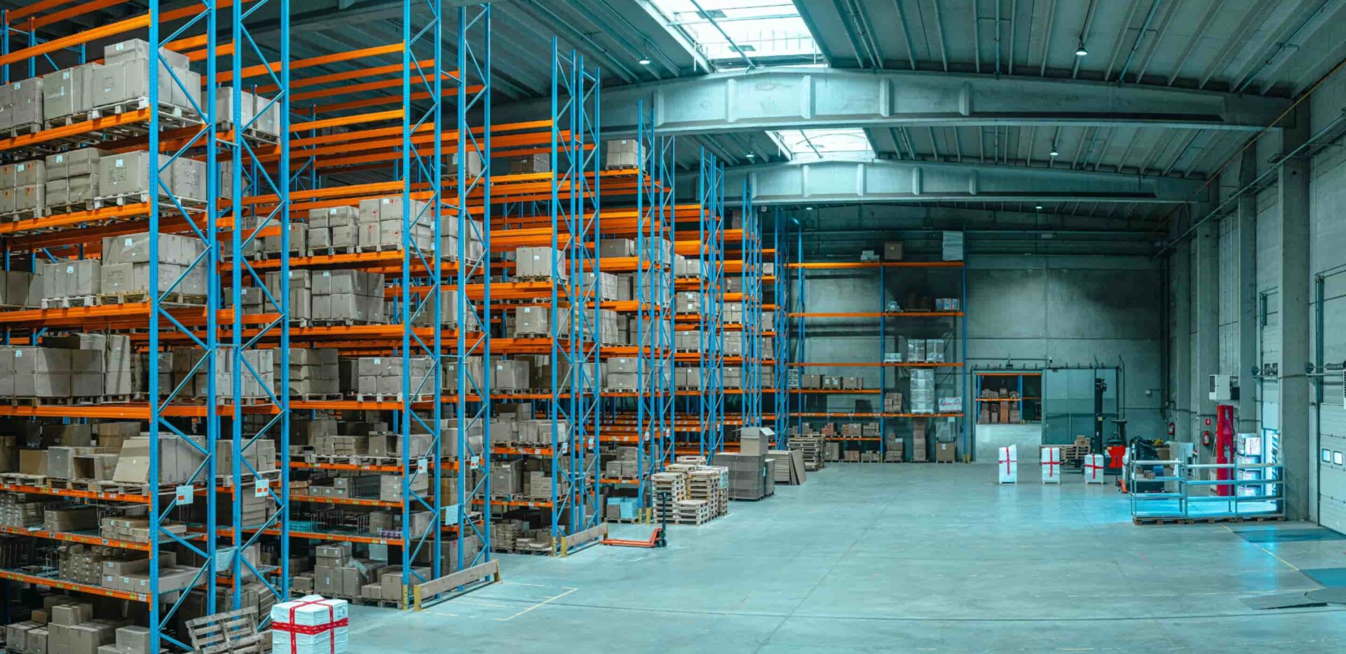 Marvel robot cleaning a logistics warehouse aisle